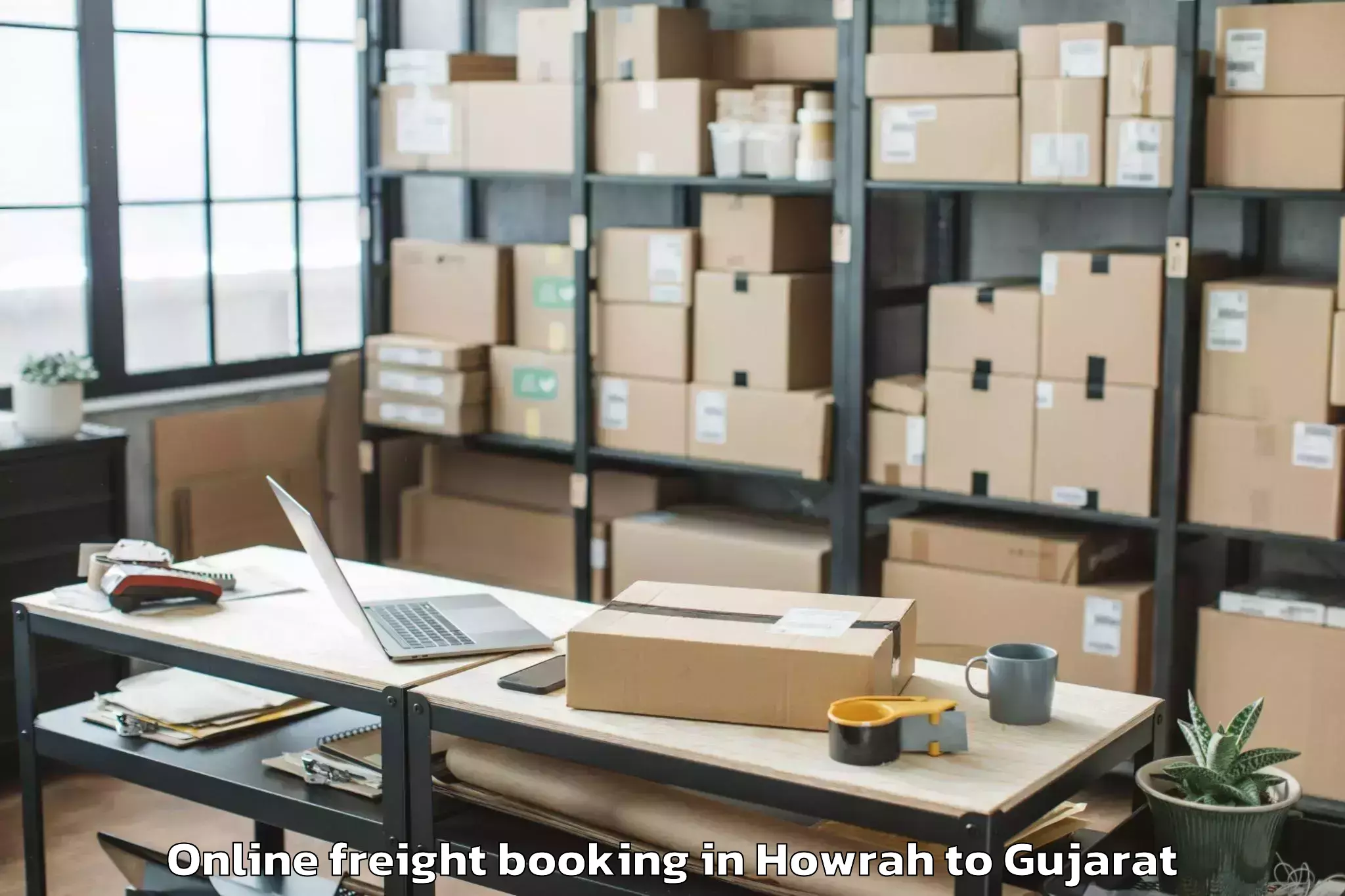 Top Howrah to Bhilad Online Freight Booking Available